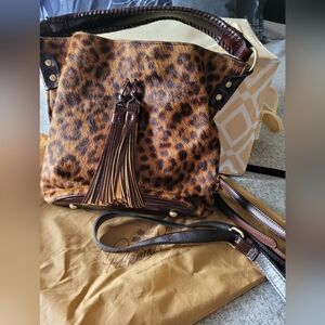 Calf hair saddle leather leopard handbag